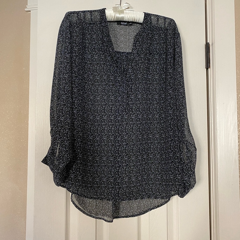 Black see-through blouse. Size M
